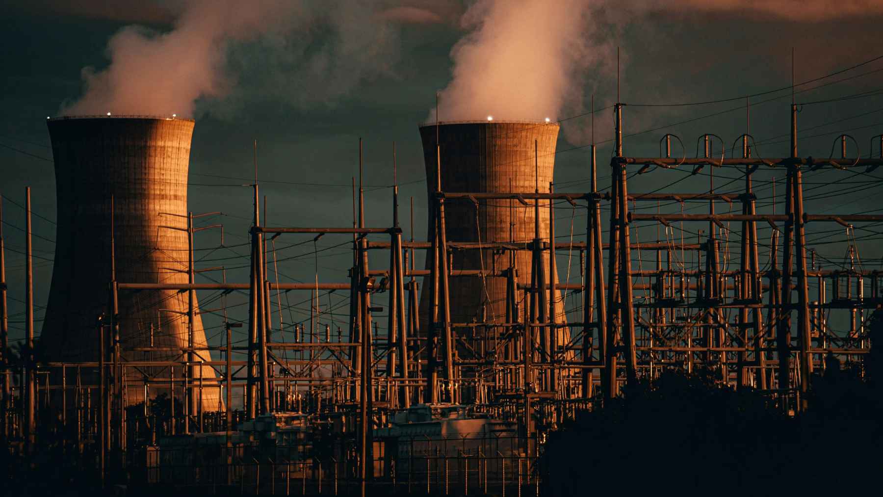 A nuclear power plant facility operating under strict international safety safeguards and clean energy initiatives.