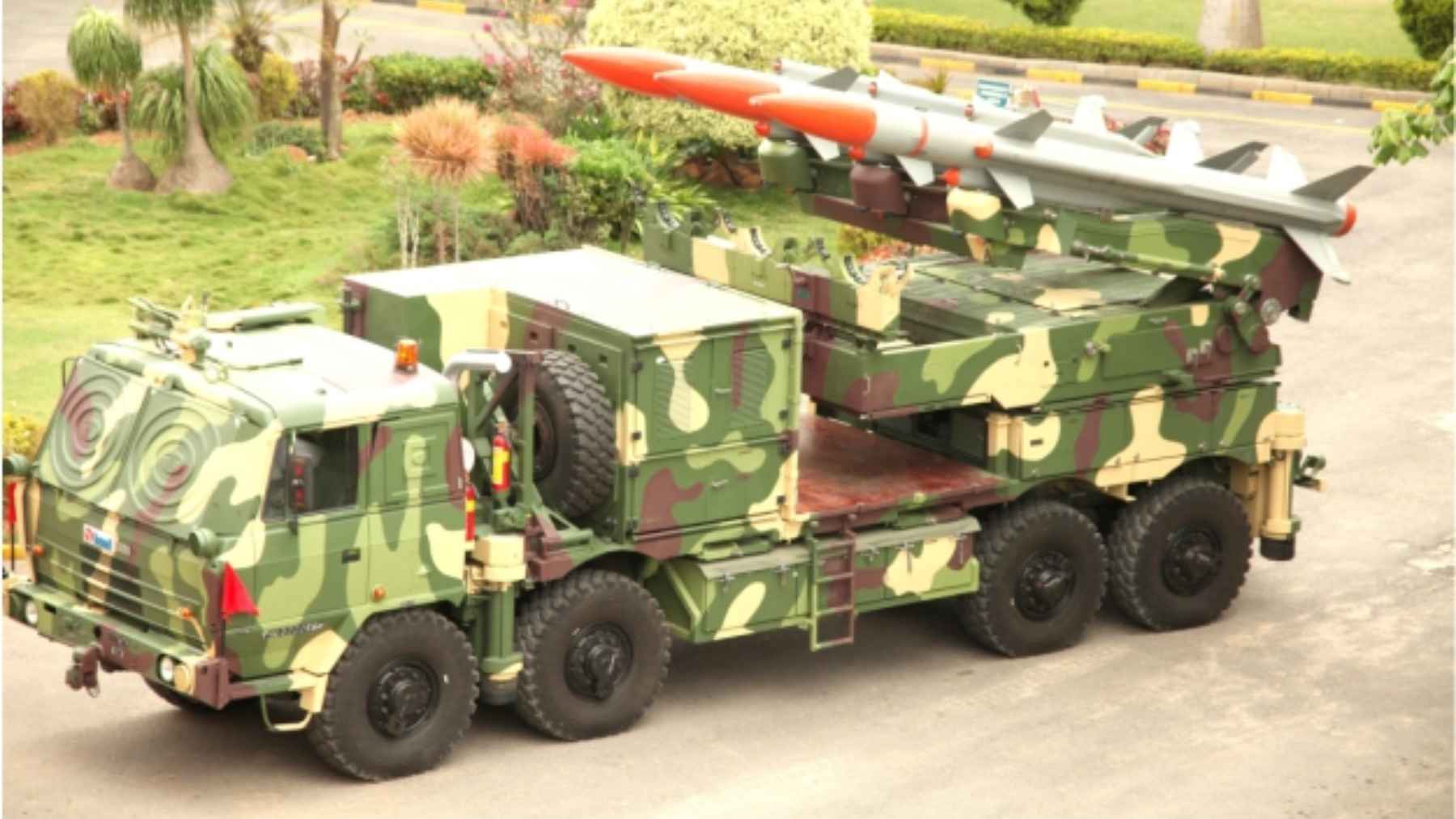 A guided missile system on display during an Indian defense technology and manufacturing exhibition.