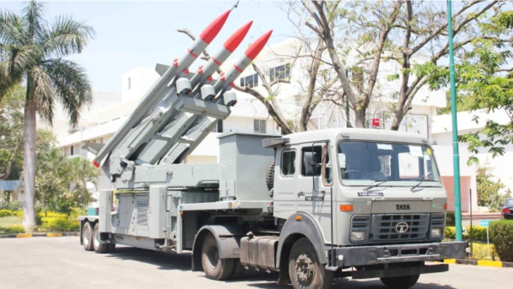 A guided missile system on display during an Indian defense technology and manufacturing exhibition.