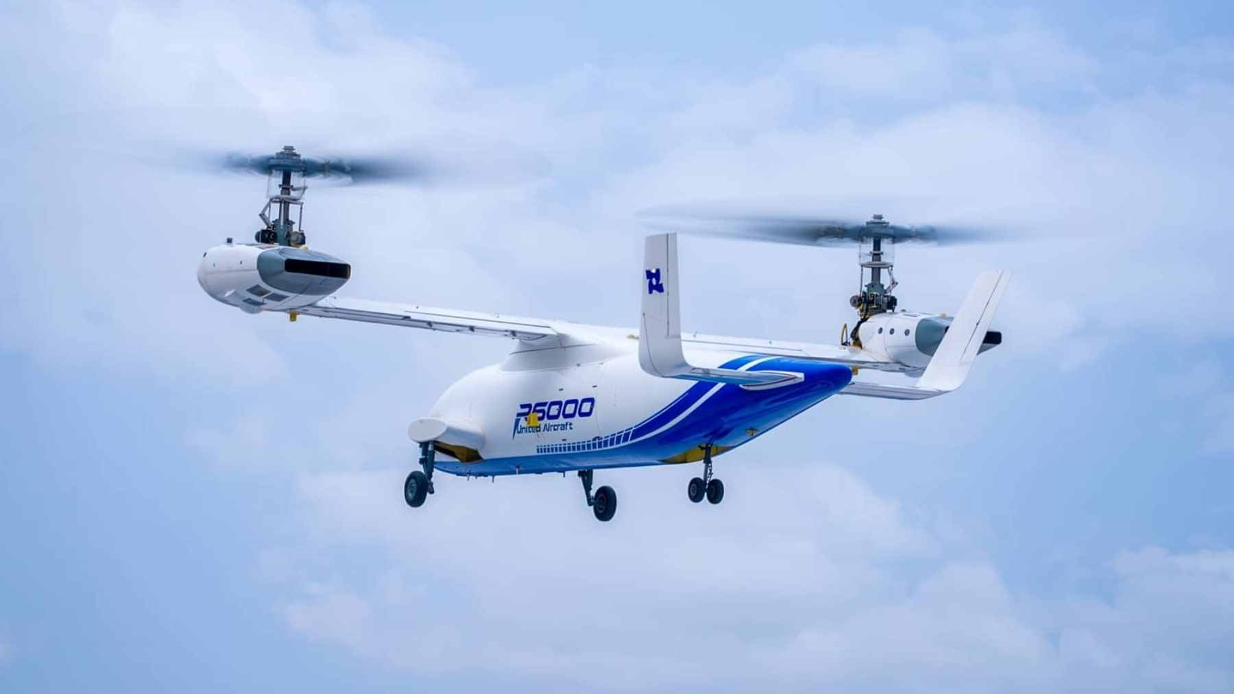 The R6000 autonomous tiltrotor drone performing a transition from hover to forward flight during untethered testing.