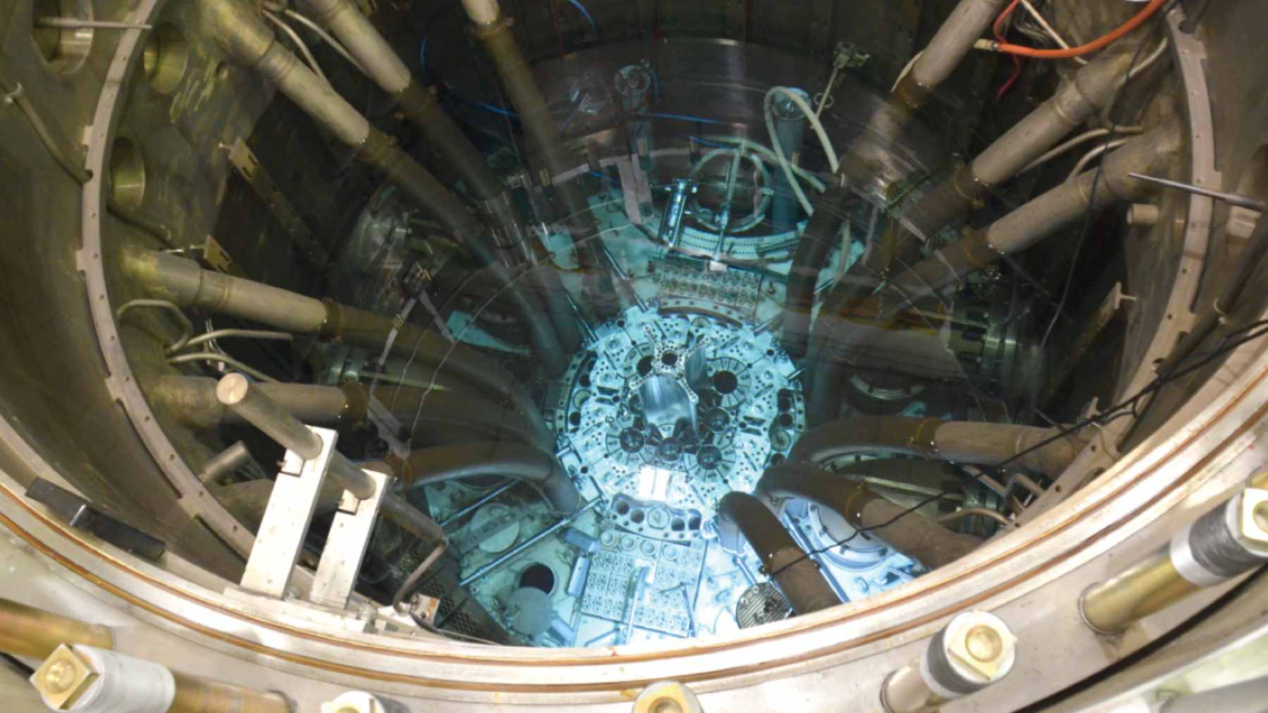 Lightbridge engineering team inspecting capsule samples after their removal from the Idaho National Laboratory Advanced Test Reactor vessel.