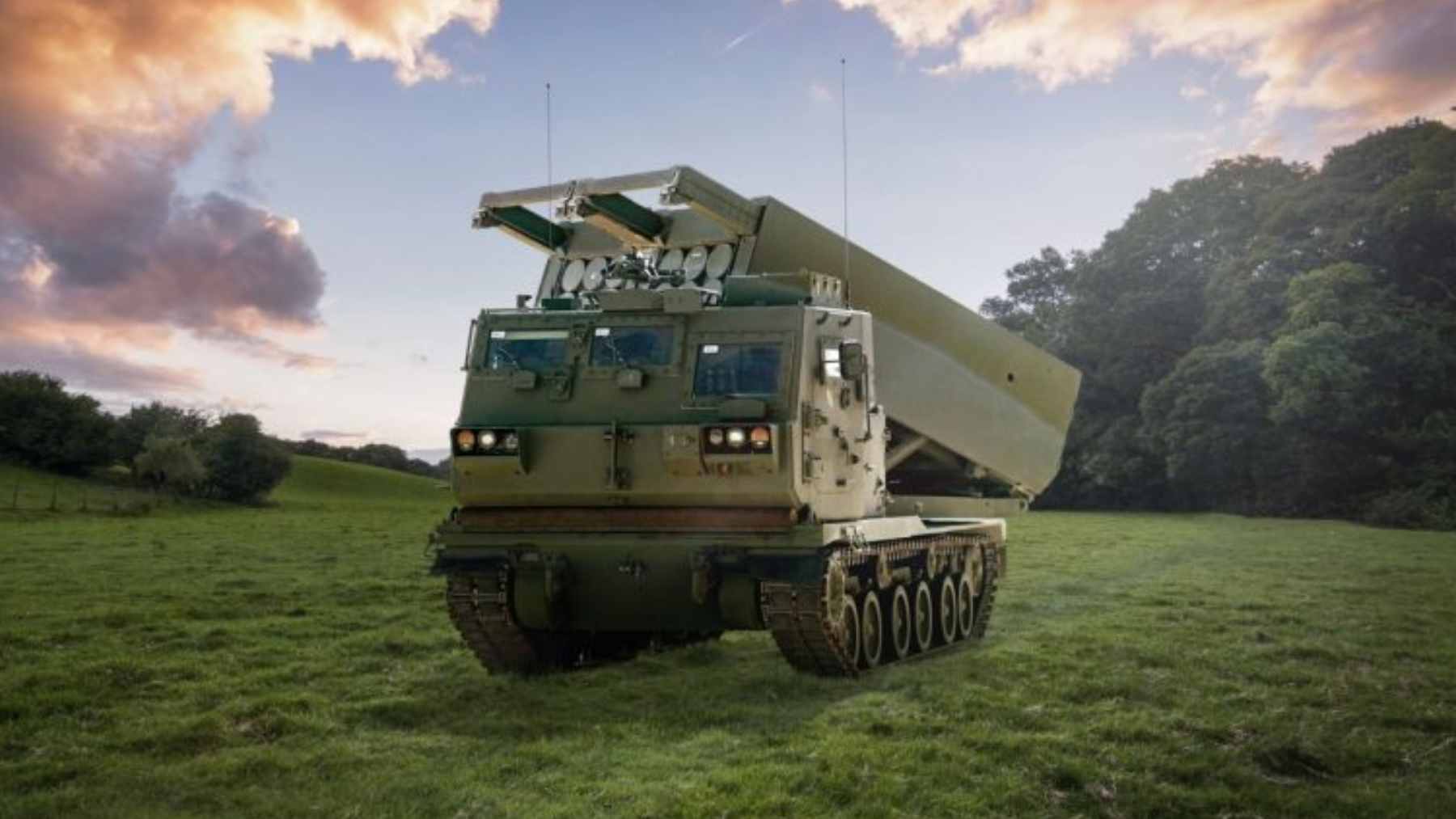 Lockheed Martin opened Europe's first HIMARS maintenance hub in Tampere: what it means for NATO's autonomy 2 A HIMARS rocket launcher vehicle parked in a training field, representing the precision firepower and electronic fire control systems supported by the new maintenance hub in Finland.