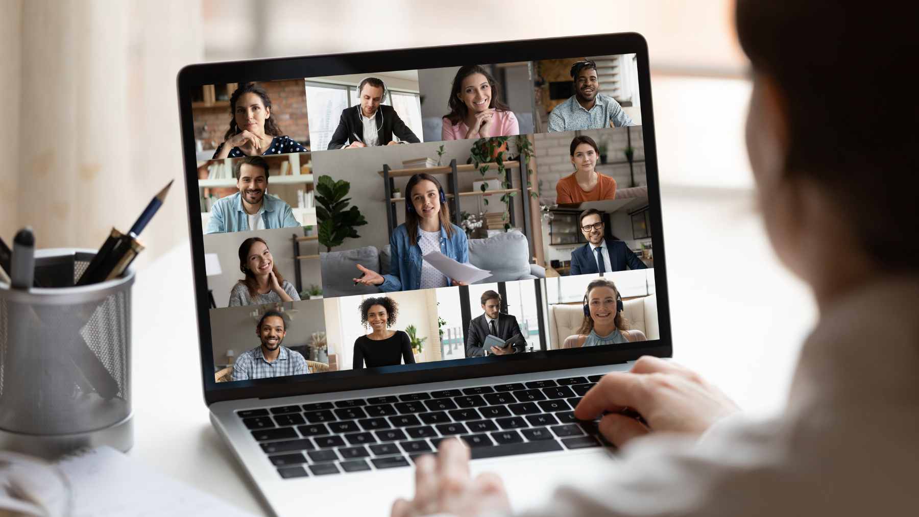 It's not just monitoring software anymore: Microsoft's new tool can tell your boss when you slip out of the office 1 A digital icon representing a Microsoft Teams status indicator superimposed over a modern office workspace environment.