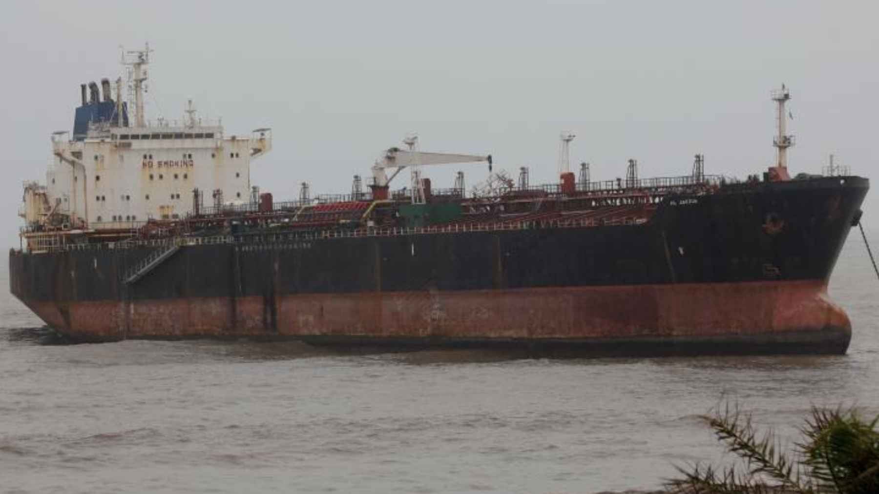 A tanker ran aground off Mumbai: what India found onboard turned a wreck into a smuggling case 1 An abandoned oil tanker grounded on a rocky shoreline near Mumbai during monsoon season.