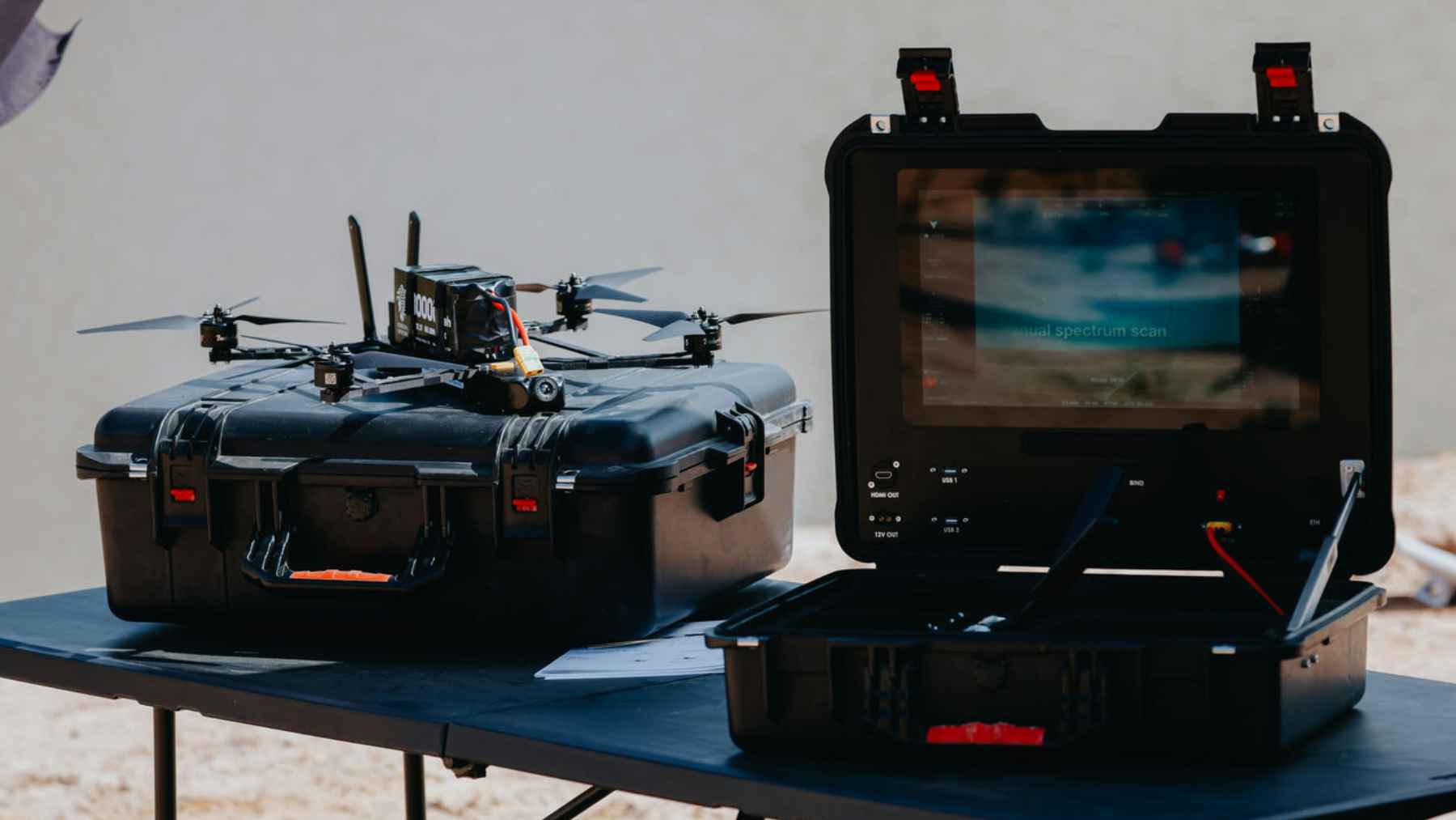 A military surveillance aircraft flying in the sky, representing NATO's new defense initiatives and counter-drone systems.