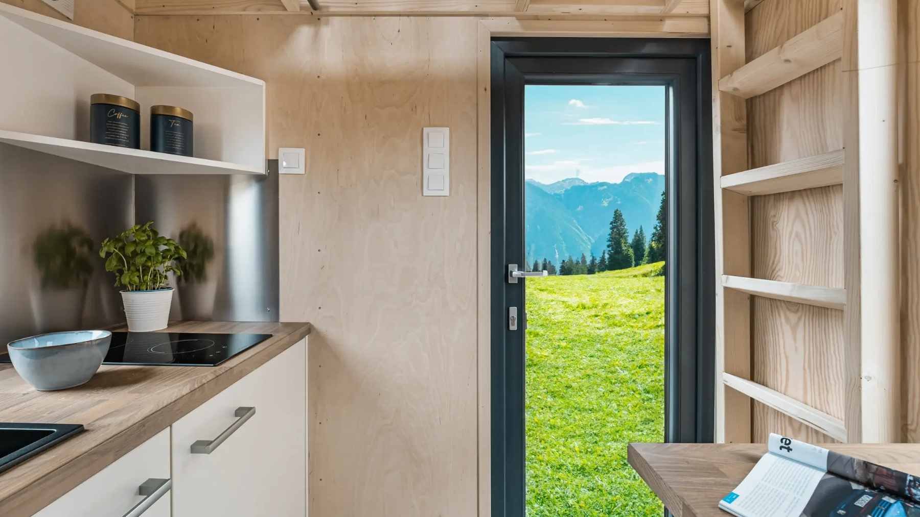 This skyscraper-style tiny house sleeps two in a footprint smaller than you'd think: how it stacks rooms instead of spreading out 2 The La Ruche tiny home by Quadrapol, featuring a vertical two-story design that packs a full kitchen, bathroom, and bedroom into a 107-square-foot footprint.