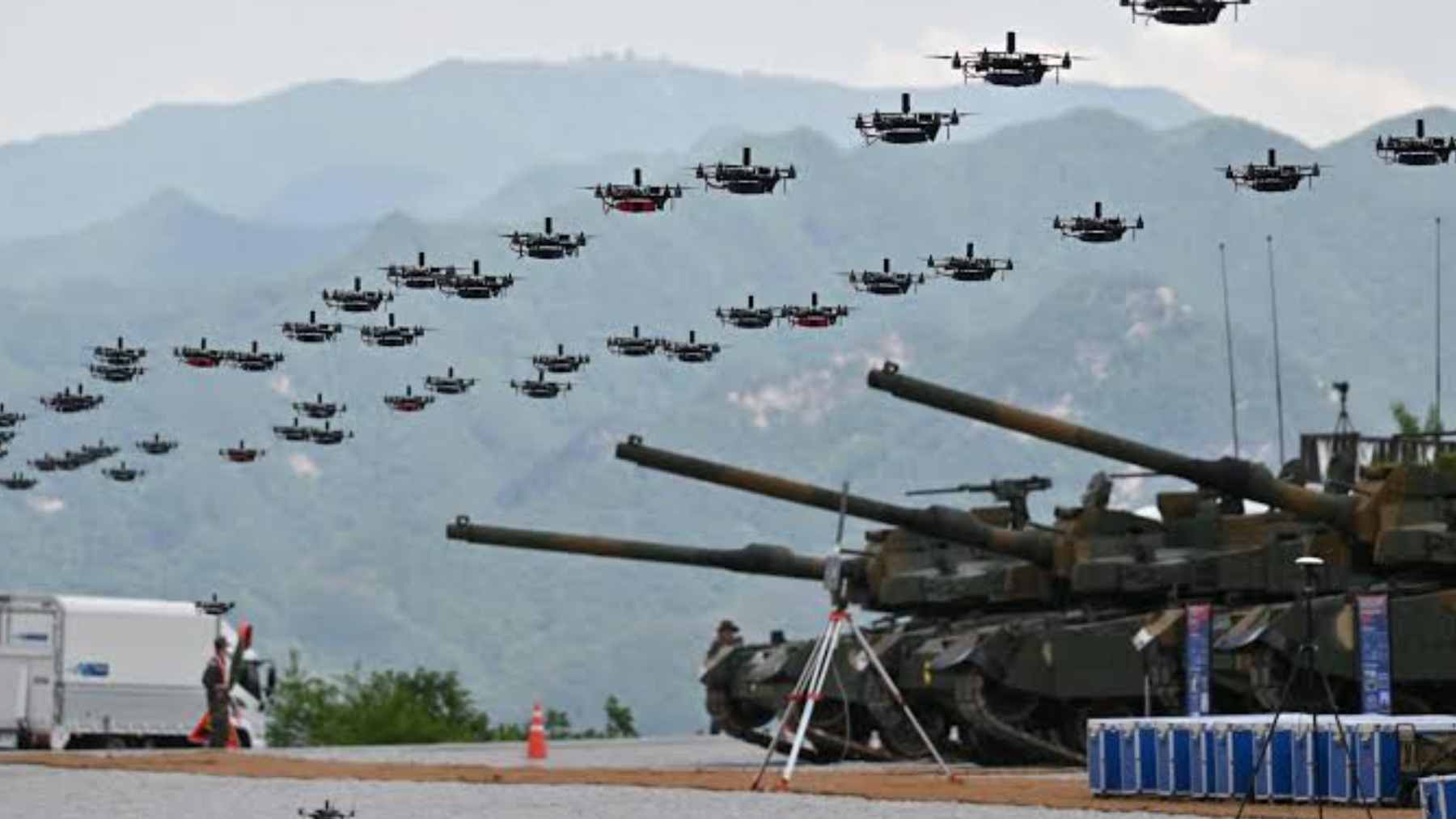 South Korean Air Force Vulcan air-defense guns engaging a drone swarm during a live-fire training exercise.