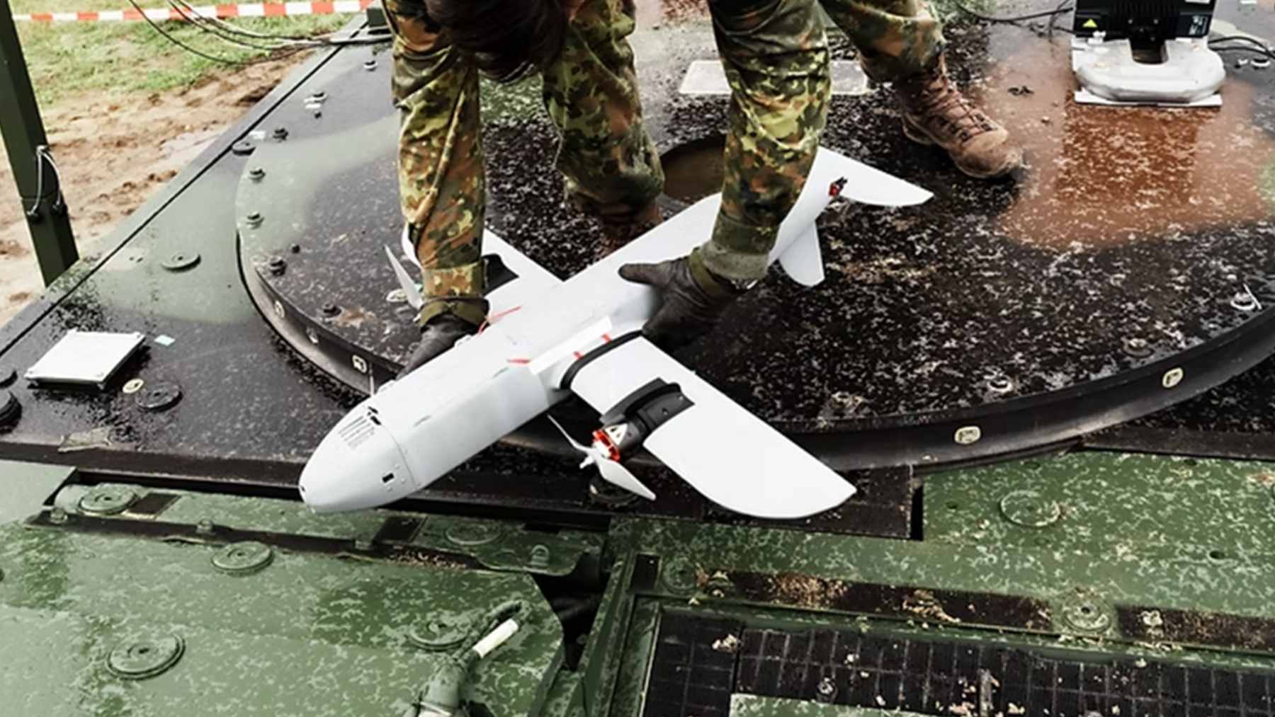 An autonomous Tytan Technologies interceptor drone in flight, designed to detect and neutralize aerial threats for infrastructure protection.