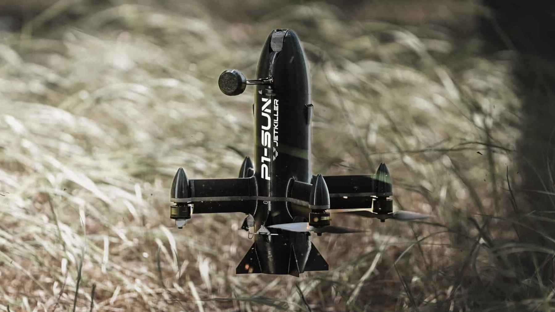 Ukraine's cheap interceptor drone, nicknamed 'the little bird,' is knocking Russian Shaheds out of the sky 2 A small interceptor drone flying over a landscape during counter-drone operations against incoming aerial threats.