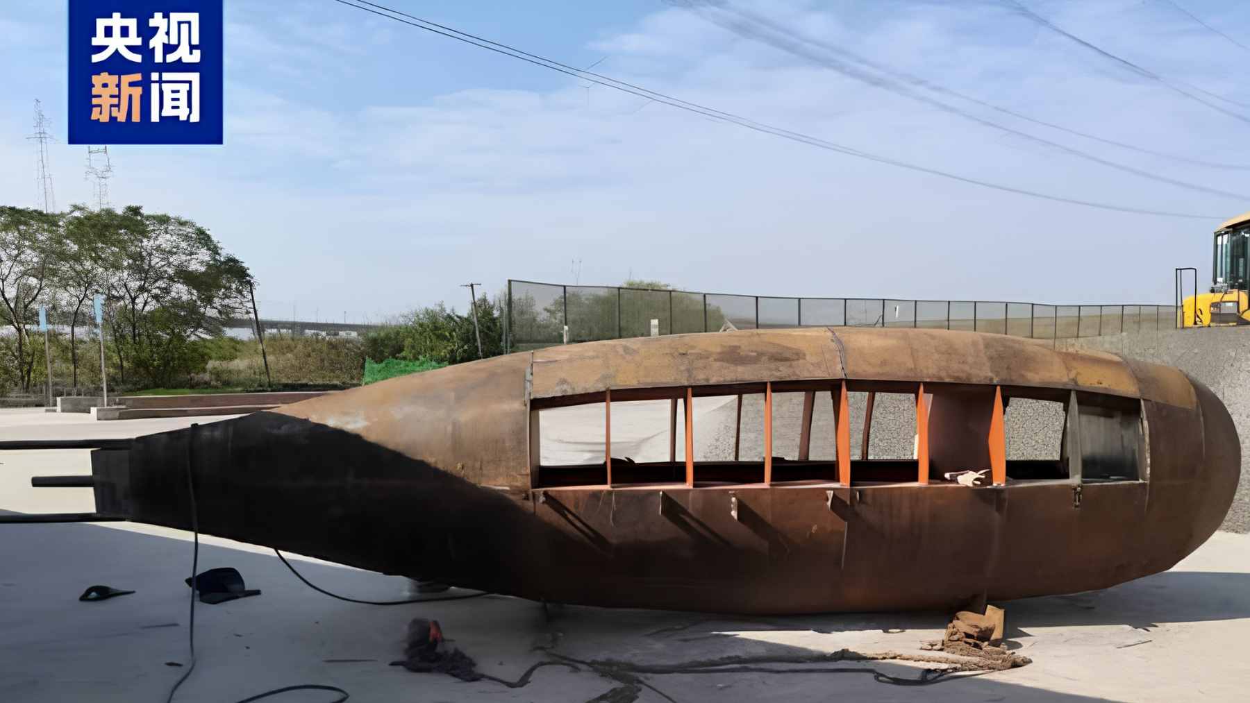 A Chinese farmer in his 60s built an 11,000-pound homemade submarine in his village and launched it into a river in Anhui, as if it were an impromptu naval test 2 Zhang Shengwu’s homemade submarine, nicknamed "Big Black Fish," floating in a river in Hanshan County, China, during a local test.