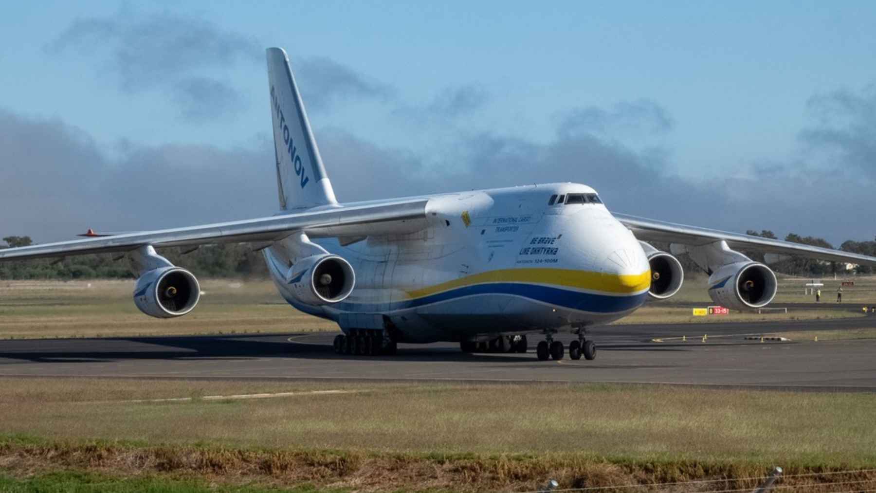 The Antonov AN-124, the biggest cargo plane still flying, is returning to Melbourne, and the load it comes 2 The massive Antonov AN-124 cargo aircraft parked on the tarmac, representing heavy-lift logistics and aerospace supply chain transport.