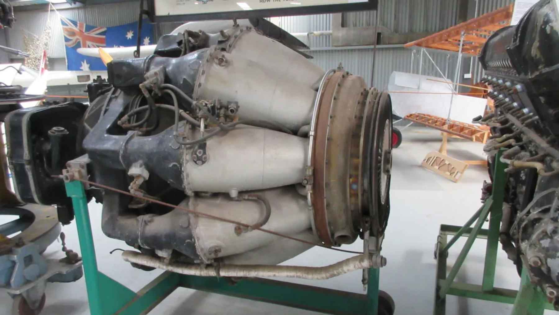 Technical school students in Argentina inspecting and restoring a historic World War Two jet engine.