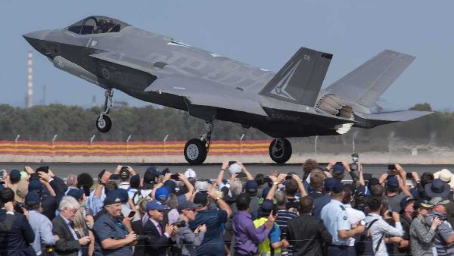 An Australian F-35A Lightning II fighter jet in flight, representing Royal Australian Air Force defense capabilities and modern tactical aviation strategy.