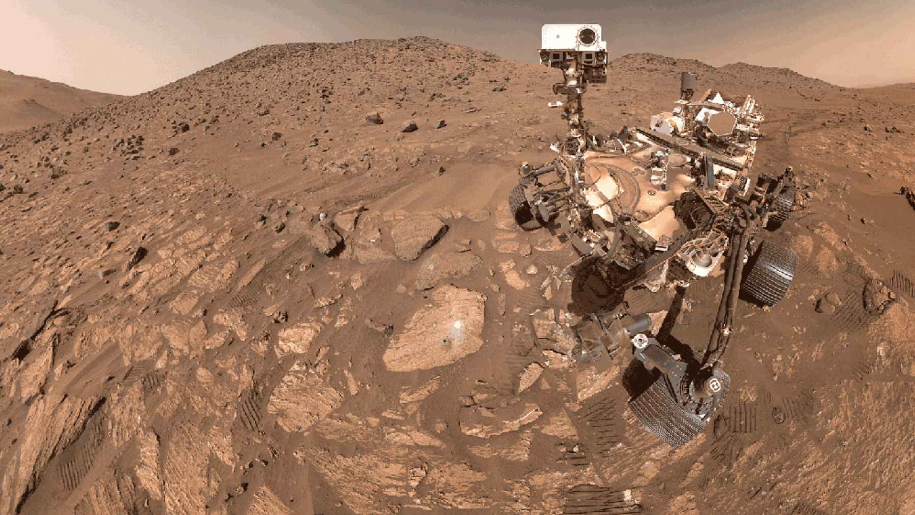 A high-tech laboratory setting showcasing space engineering hardware and satellite components developed by AVS.