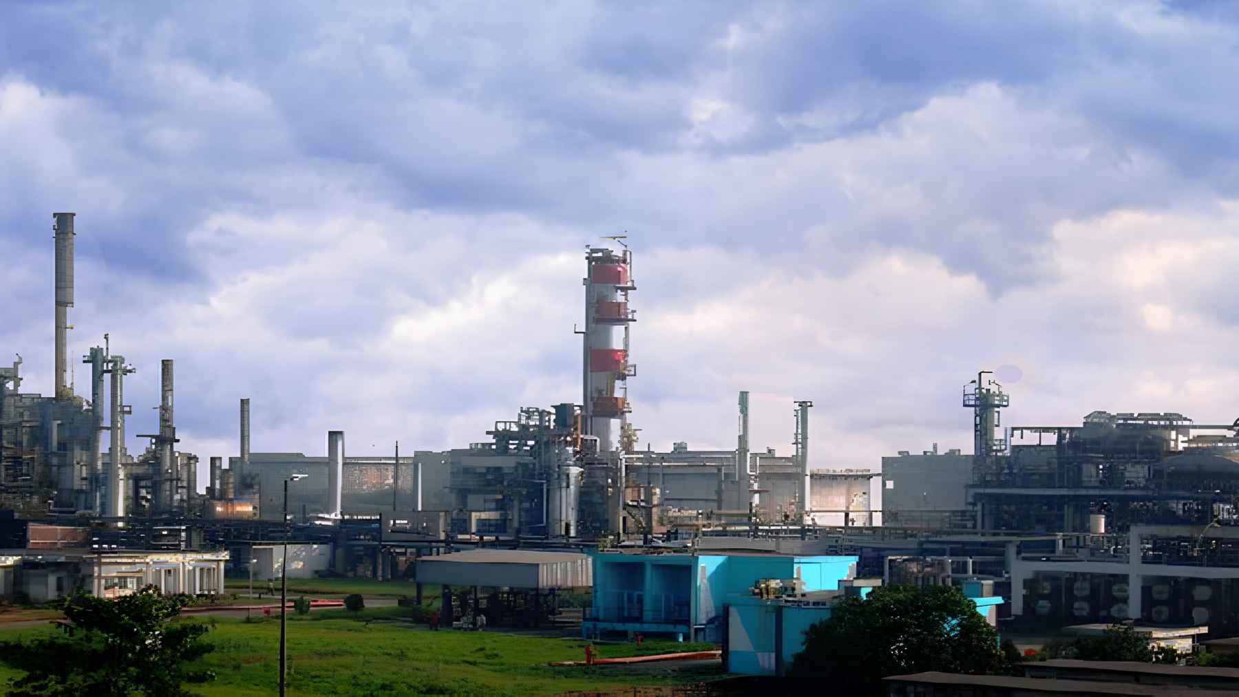 Industrial crude oil refinery processing towers and piping in Chattogram, representing energy infrastructure and financing in Bangladesh.