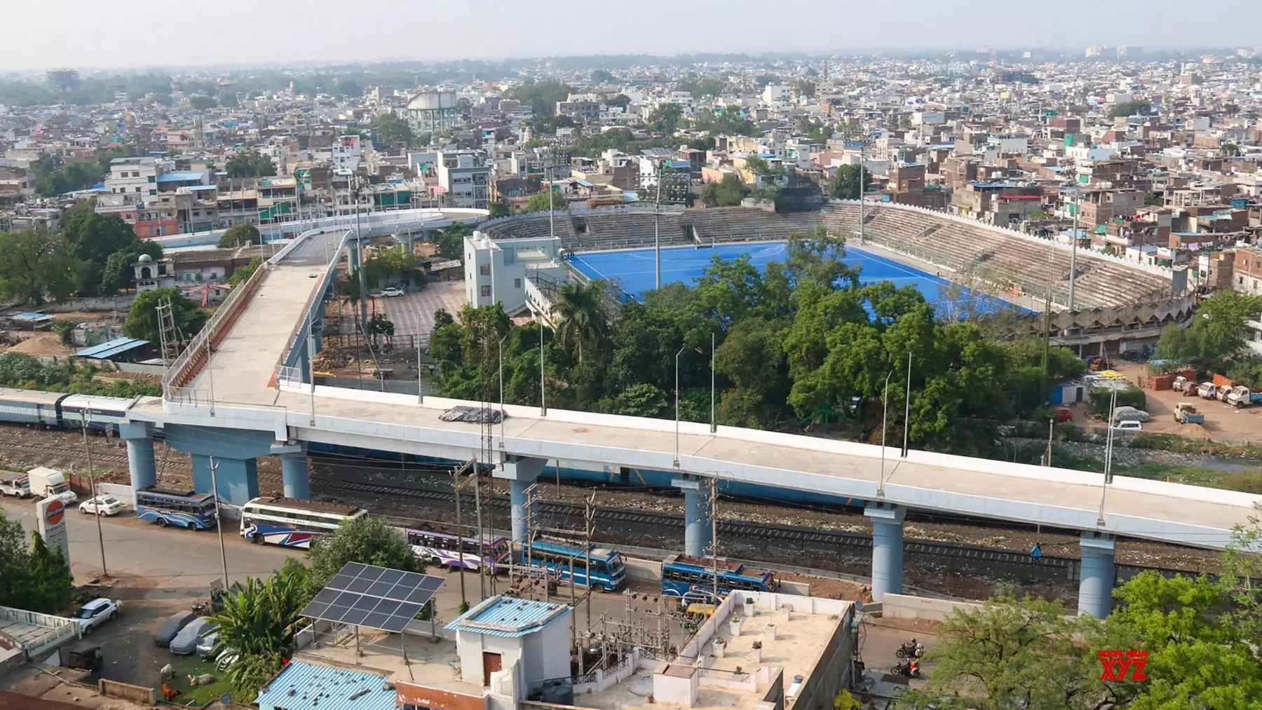 A high-angle view of the Aishbagh Rail Over Bridge in Bhopal, highlighting its sharp curve and approach layout.