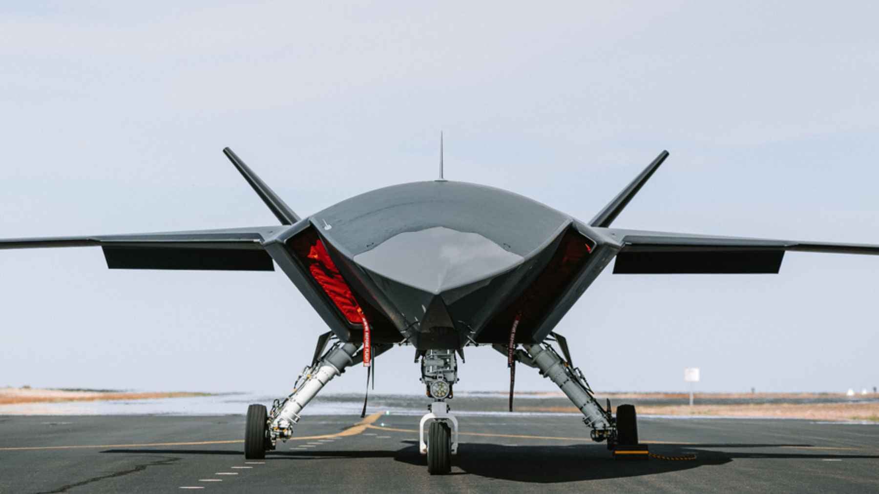 Boeing's MQ-28 Ghost Bat made its first appearance at Farnborough, and the jet it is built to escort 2 The Boeing MQ-28 Ghost Bat uncrewed combat aircraft on display, representing collaborative combat aircraft technology and military aviation.