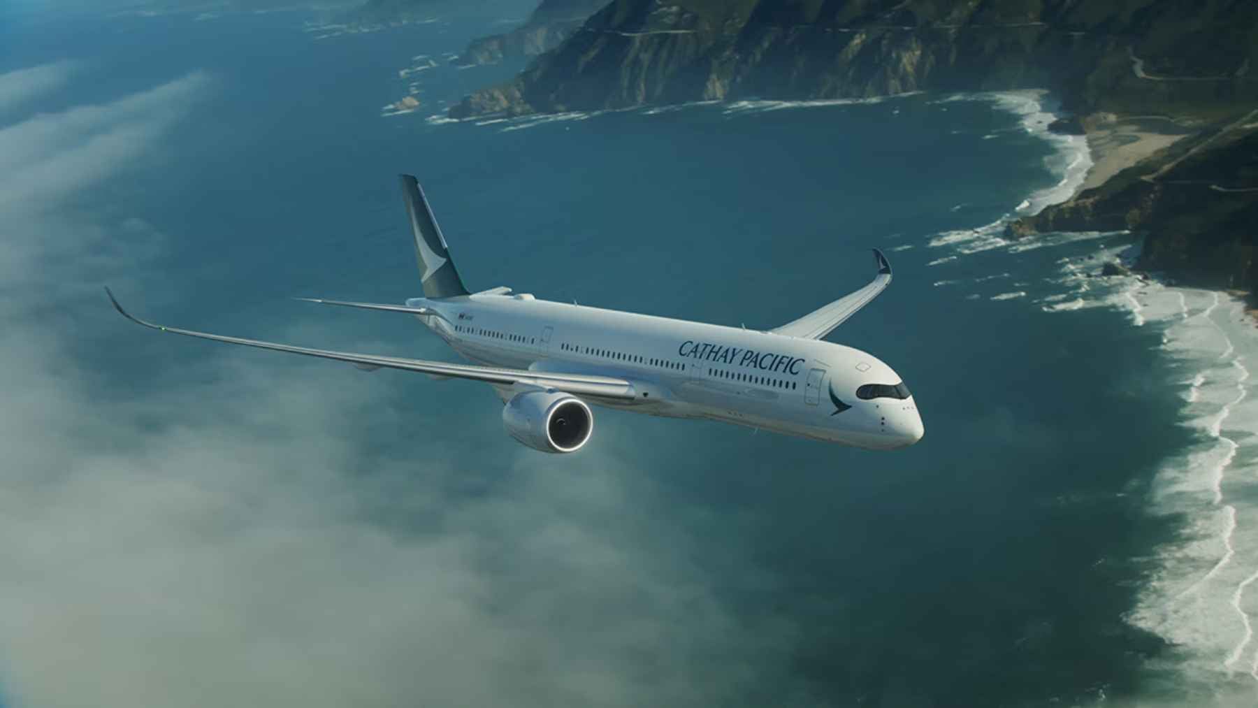 A commercial Airbus A350 flying at high altitude, representing international air travel and airspace security.