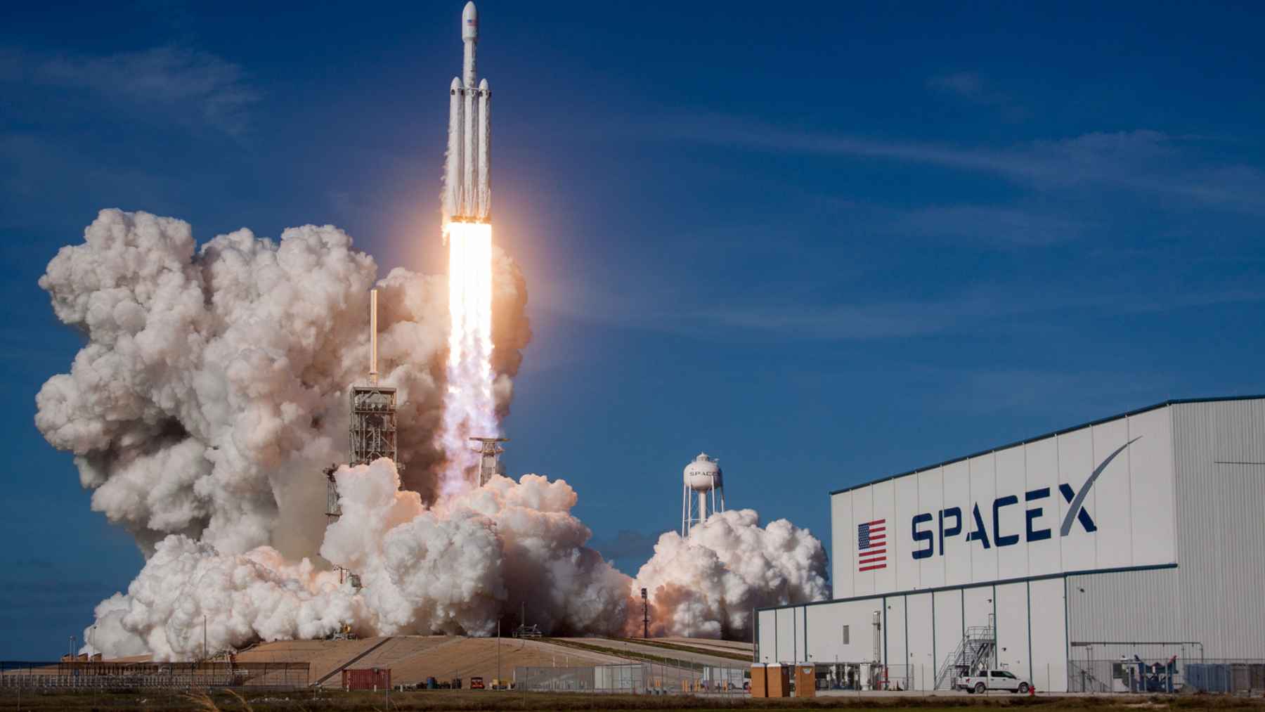 SpaceX rocket launching into orbit during a high-cadence flight test demonstration.