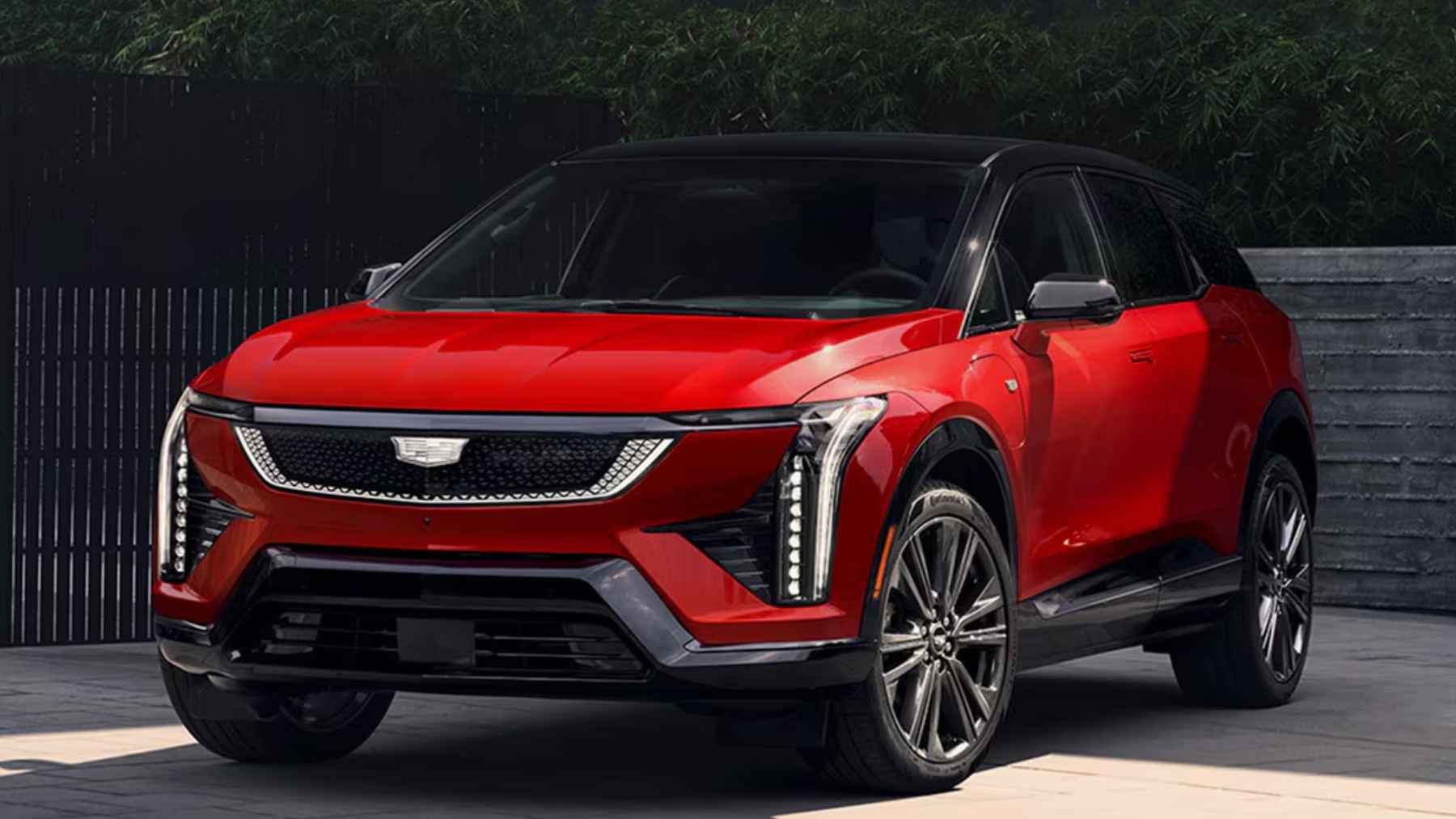 A luxury Cadillac vehicle parked outside, representing General Motors' expanding vehicle lineup and gasoline strategy.