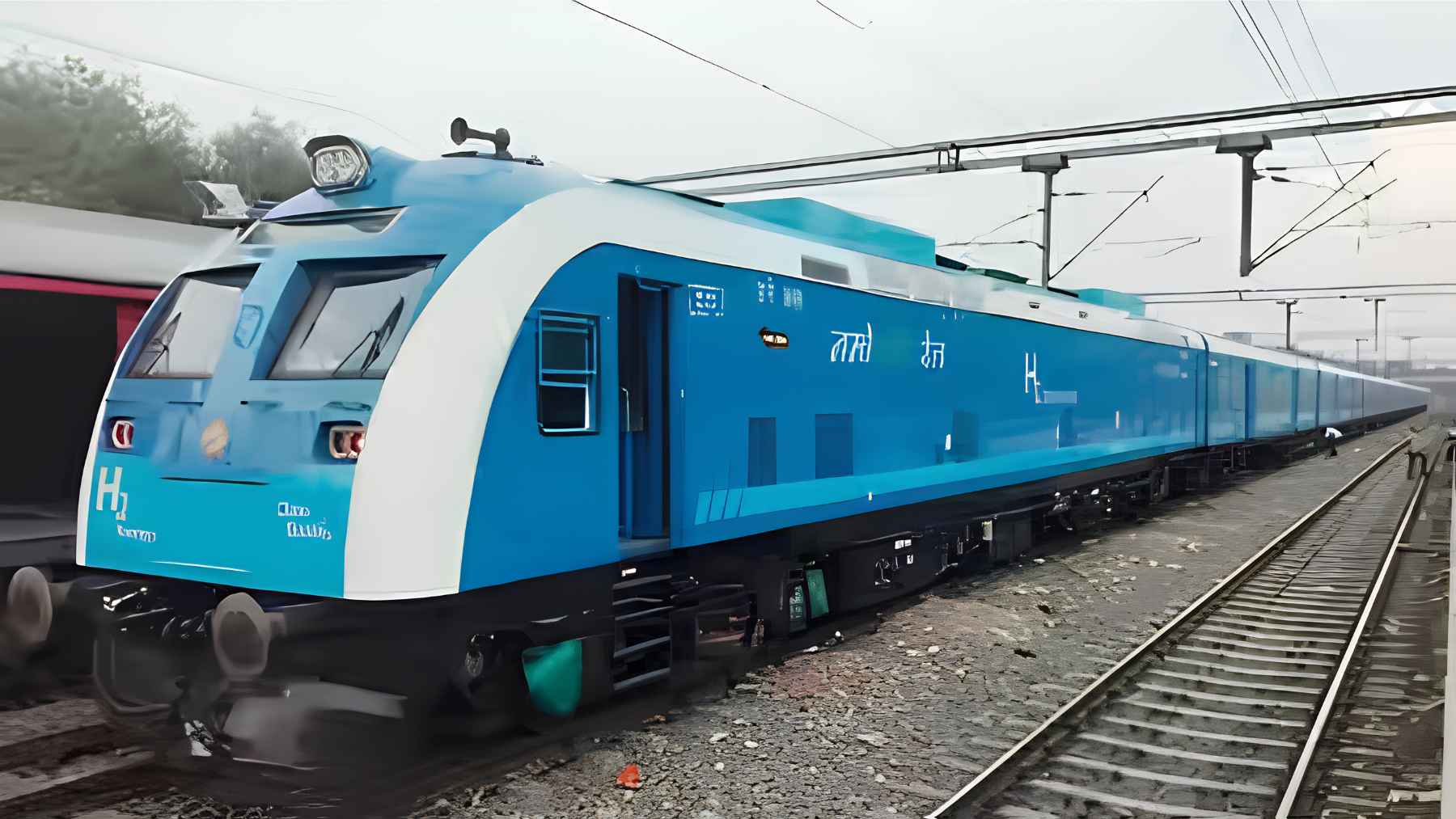 India's first hydrogen-powered passenger train operating on the railway track during commercial trials.
