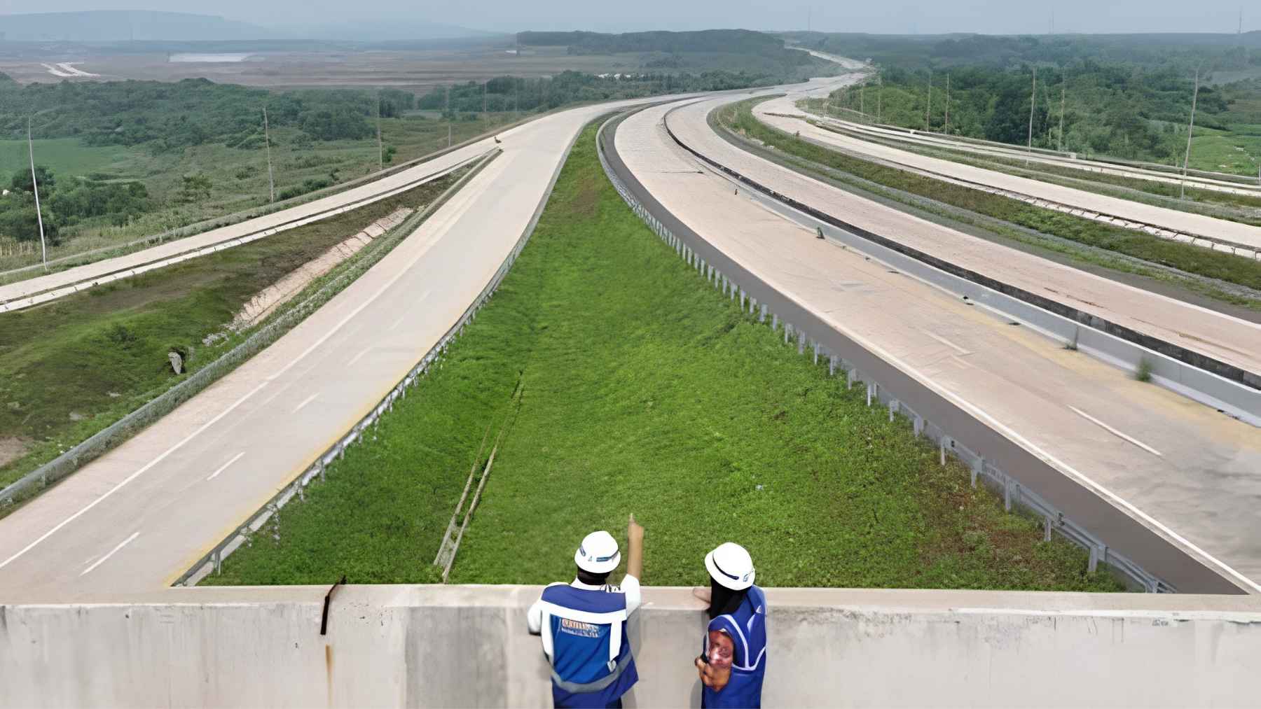 A multi-lane highway asphalt stretch designated to function as an emergency runway for military aircraft.