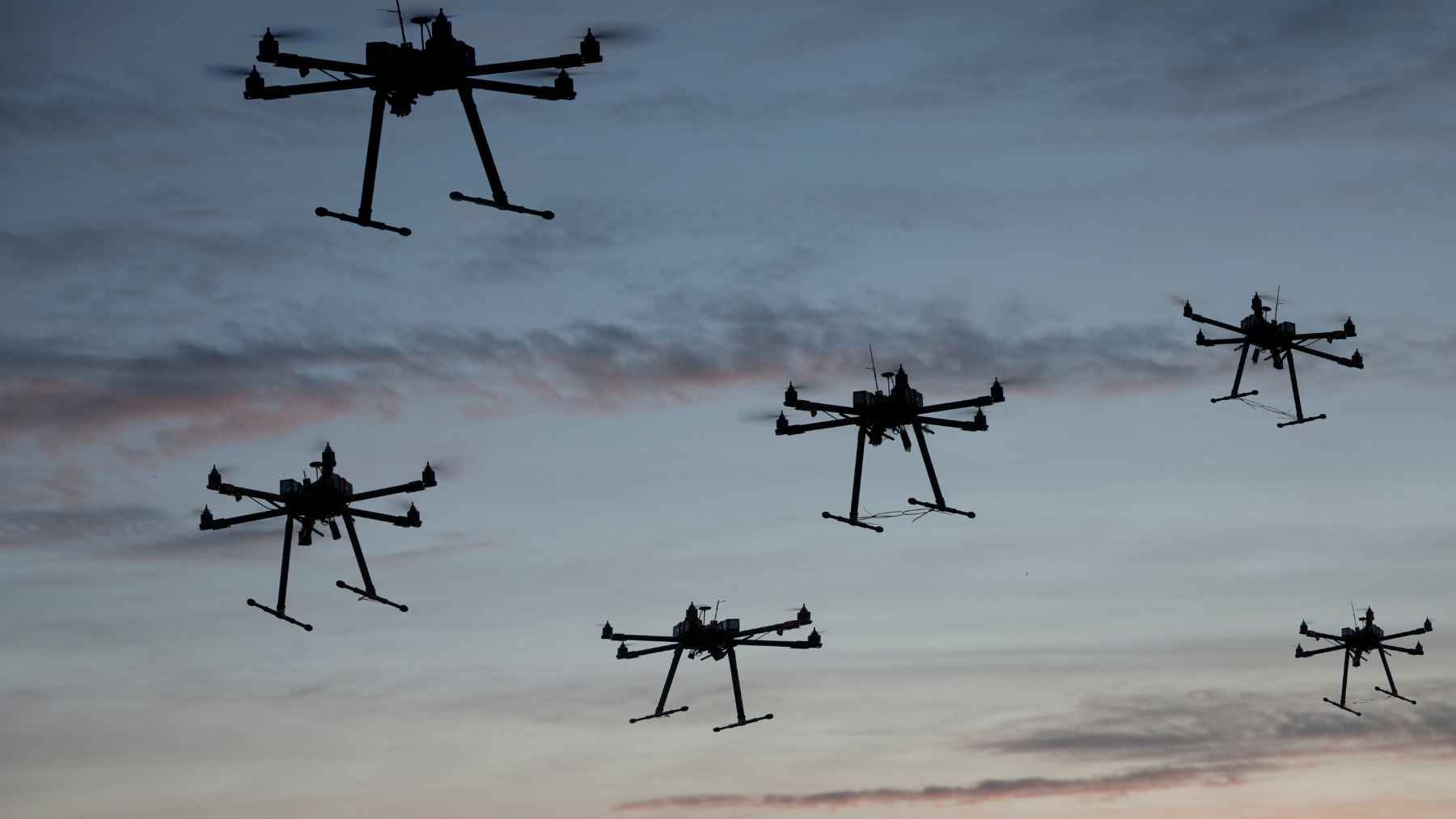 The Lockheed Martin MORFIUS X-Rotor high-power microwave drone-neutralizing aircraft displayed at an exhibition.
