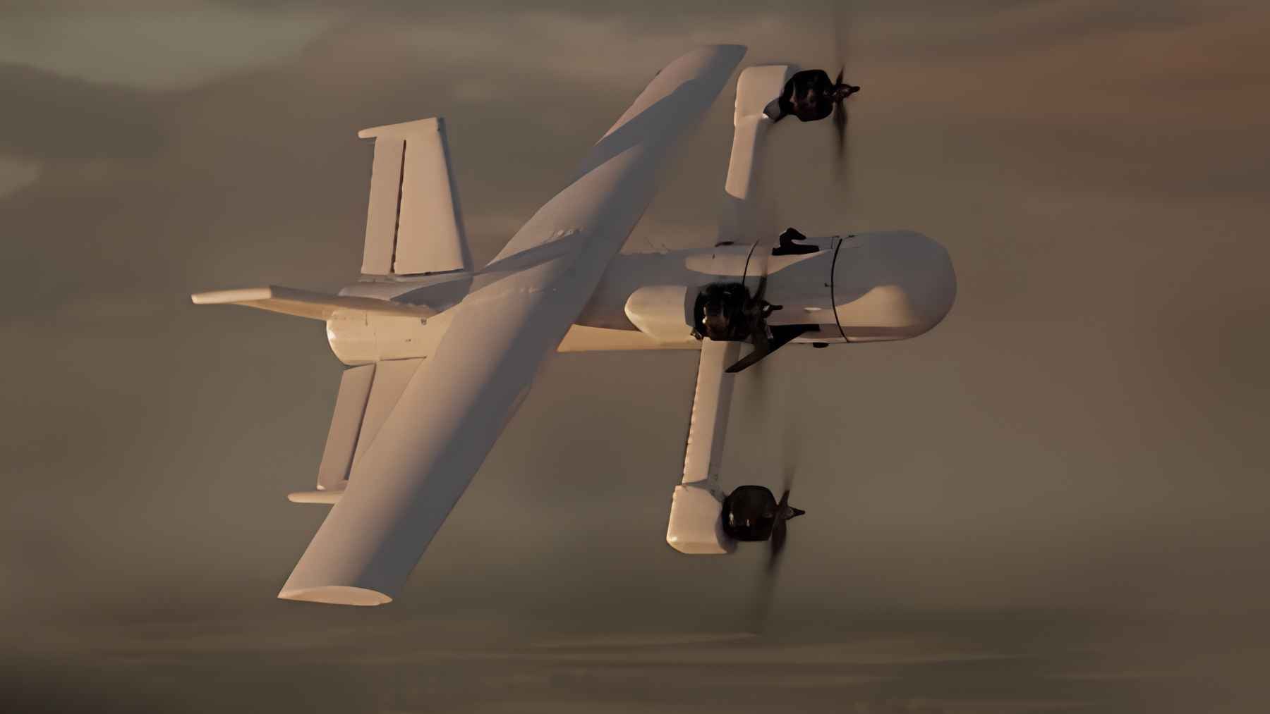The Lockheed Martin MORFIUS X-Rotor high-power microwave drone-neutralizing aircraft displayed at an exhibition.