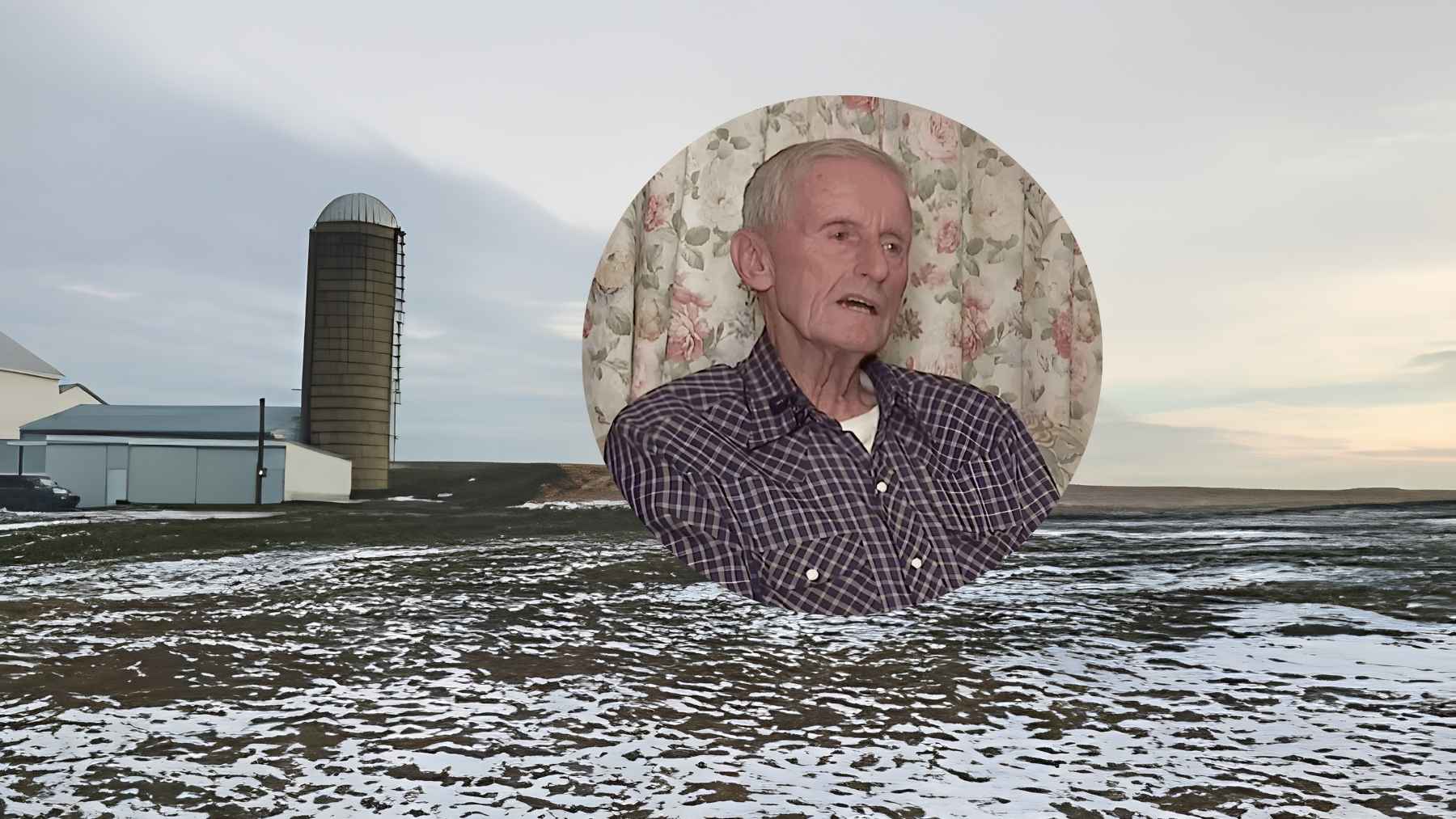 An elderly farmer standing outdoors on his historic Pennsylvania farmland to protect agricultural acreage.