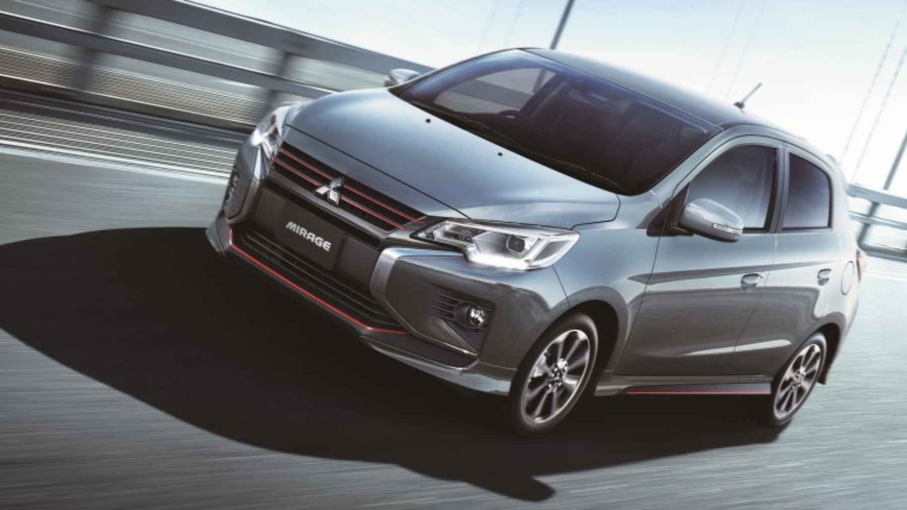 Almost 60% of the buyers of this brand are over 60, and rising list prices explain more of 2 A modern Mitsubishi vehicle parked outside a dealership, representing demographic trends and private car buyer age statistics in Germany.