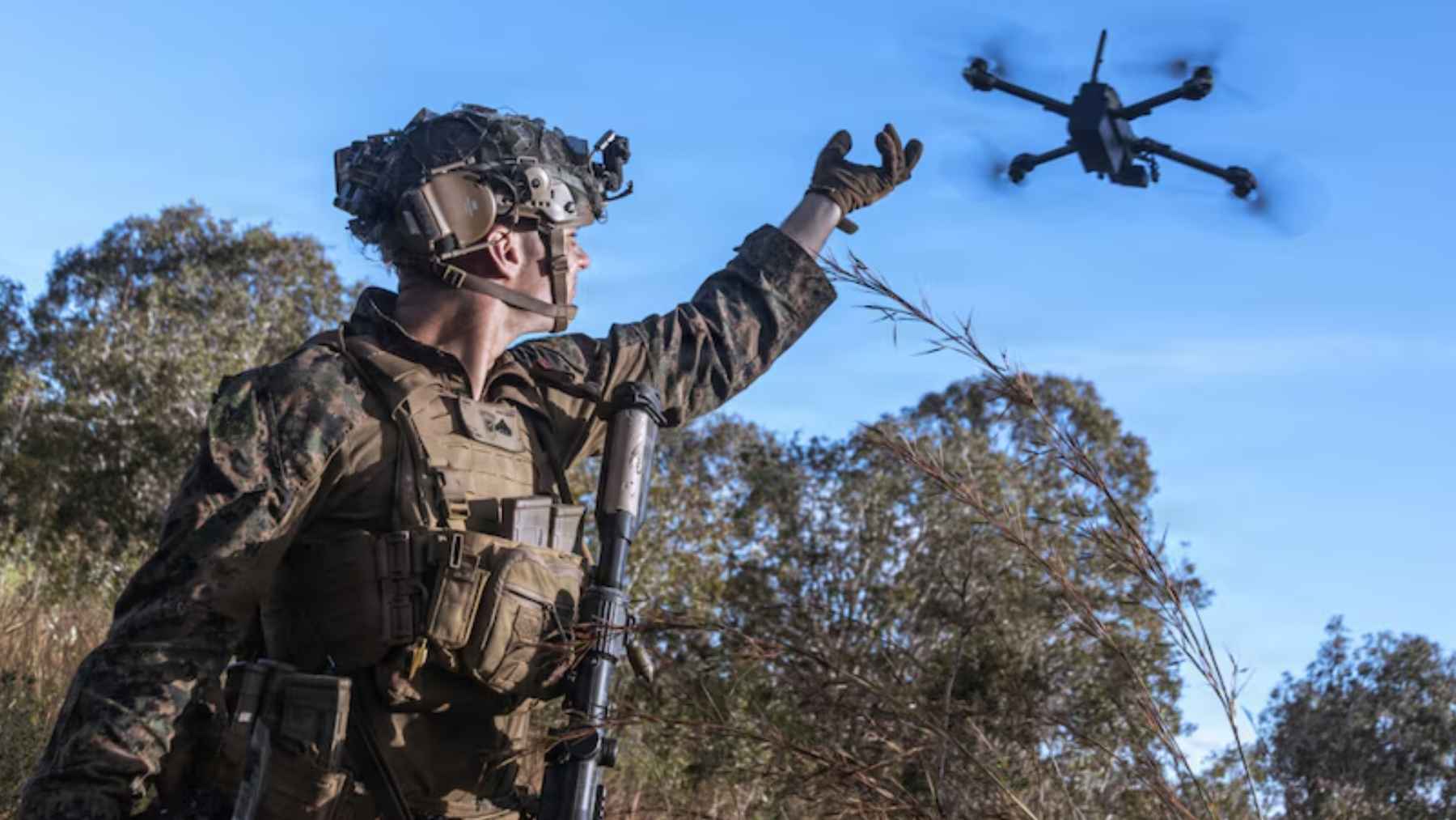 A small portable reconnaissance drone undergoing tactical flight testing for military operations.