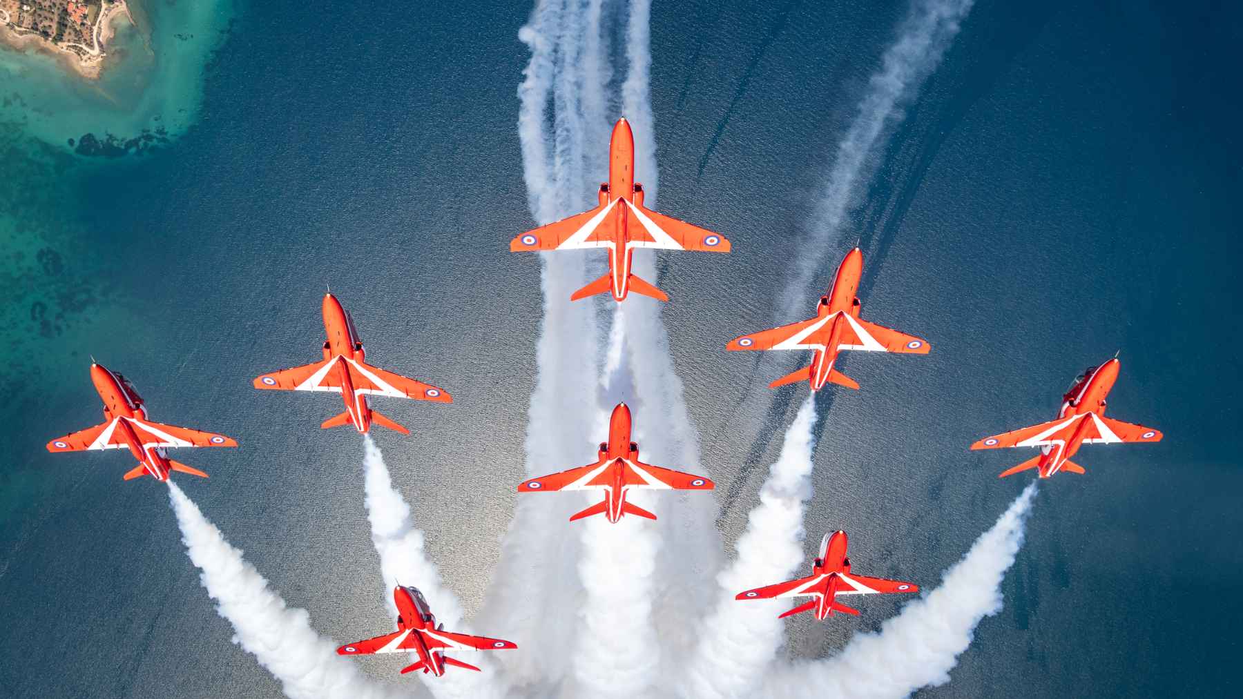 The Red Arrows aerobatic team is stuck in Canada after bad weather delayed their return to the UK 2 Royal Air Force Red Arrows Hawk T1 jets parked at Goose Bay, Canada, representing the aerobatic team's flight transit operations.