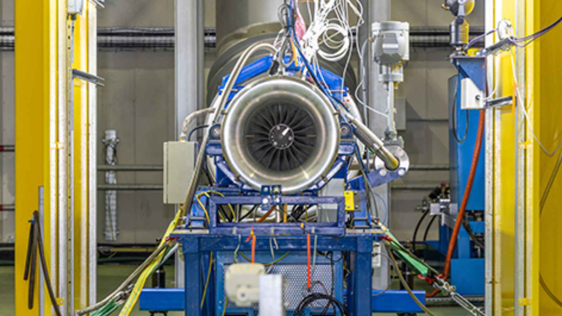A high-tech aerospace engine demonstrator turbine undergoing engineering and component testing for future fighter jets.