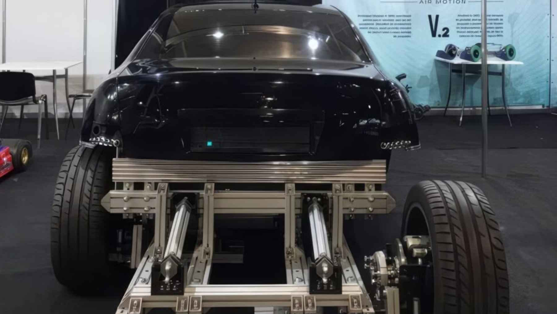 A Romanian built an Audi A8 that moves on pneumatic rams instead of an engine, and he did it in a village workshop 1 A stripped Audi A8 prototype modified with pneumatic rams and sliding wheels in a Romanian workshop.
