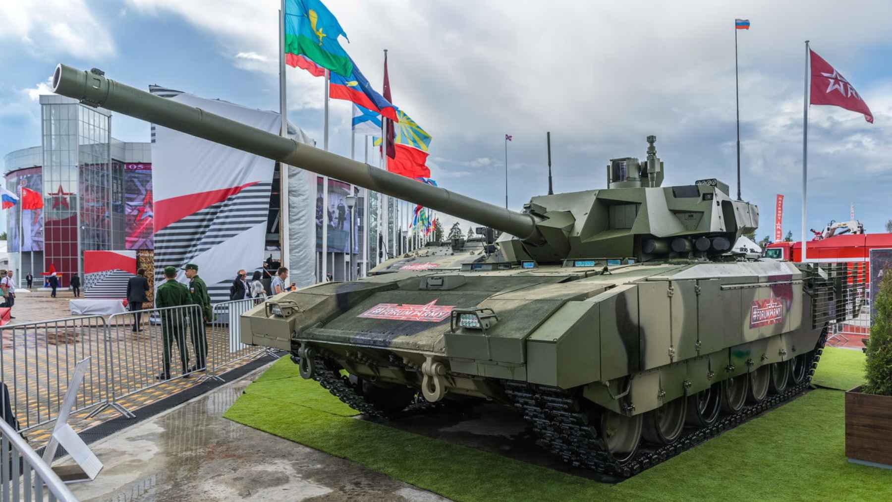 Visitors exploring military tanks and hardware on display at Russia's Patriot Park.