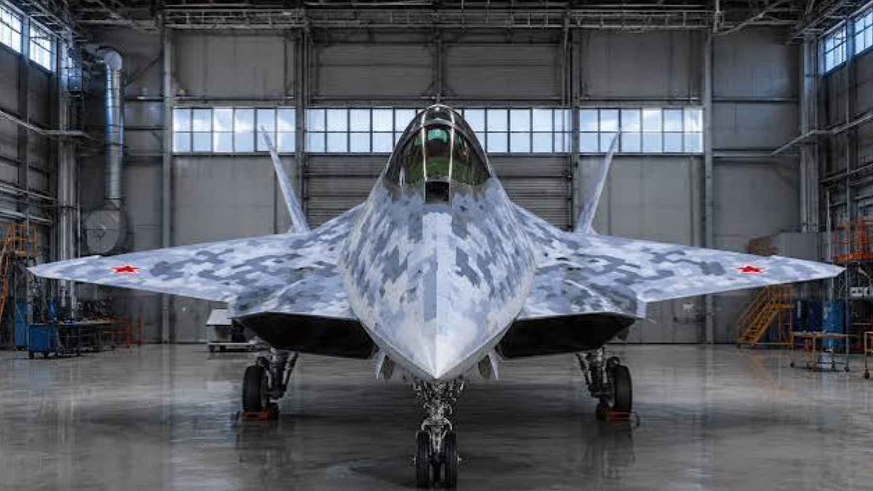 A digital concept rendering of the Russian Su-75 Checkmate single-engine stealth fighter jet on display.