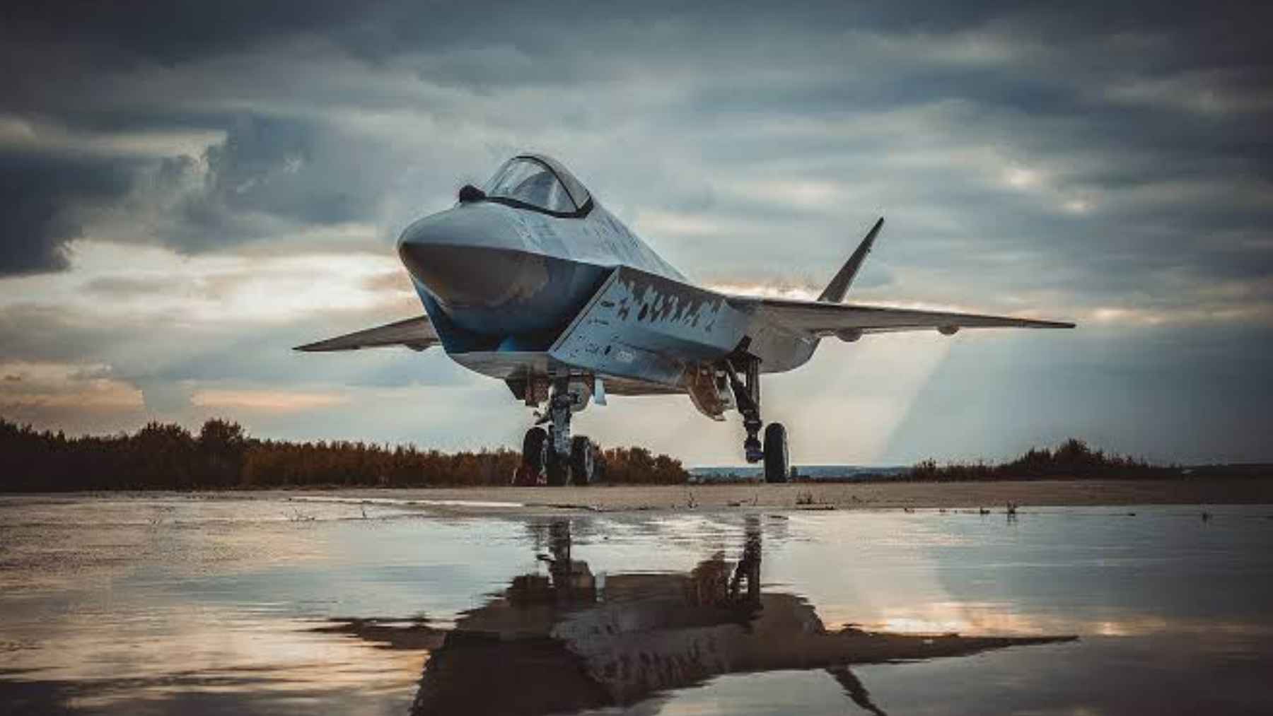 A digital concept rendering of the Russian Su-75 Checkmate single-engine stealth fighter jet on display.