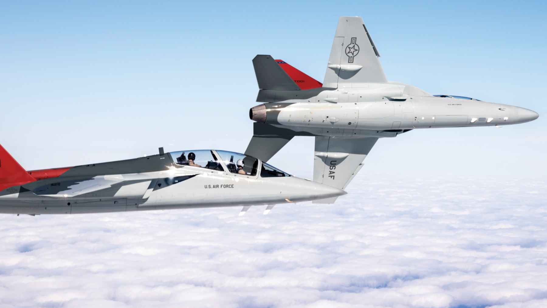 A Boeing T-7A Red Hawk advanced jet trainer aircraft in flight, representing modern military pilot training systems.