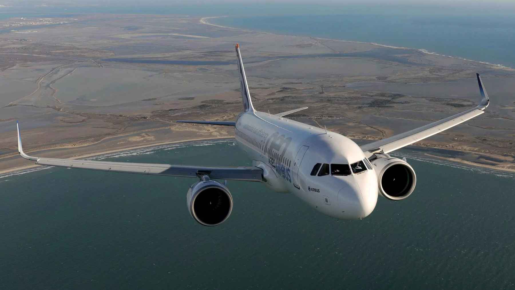 An Airbus A320neo aircraft parked on an airfield, representing commercial aviation and the market for used serviceable material.