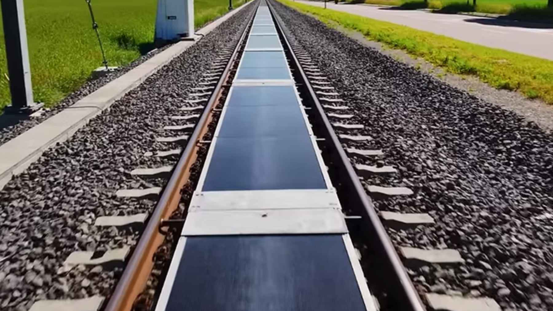 Removable solar photovoltaic panels installed between active railway tracks in Switzerland by startup Sun-Ways.