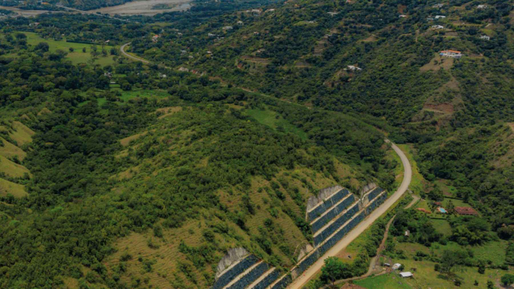 Latin America's first smart tunnel is opening: German tech, AI systems and more than 80 structures inside 1 The entrance of Colombia's TĂșnel del Toyo infrastructure project, representing the engineering, roadways, and smart systems of the new 6-mile corridor.