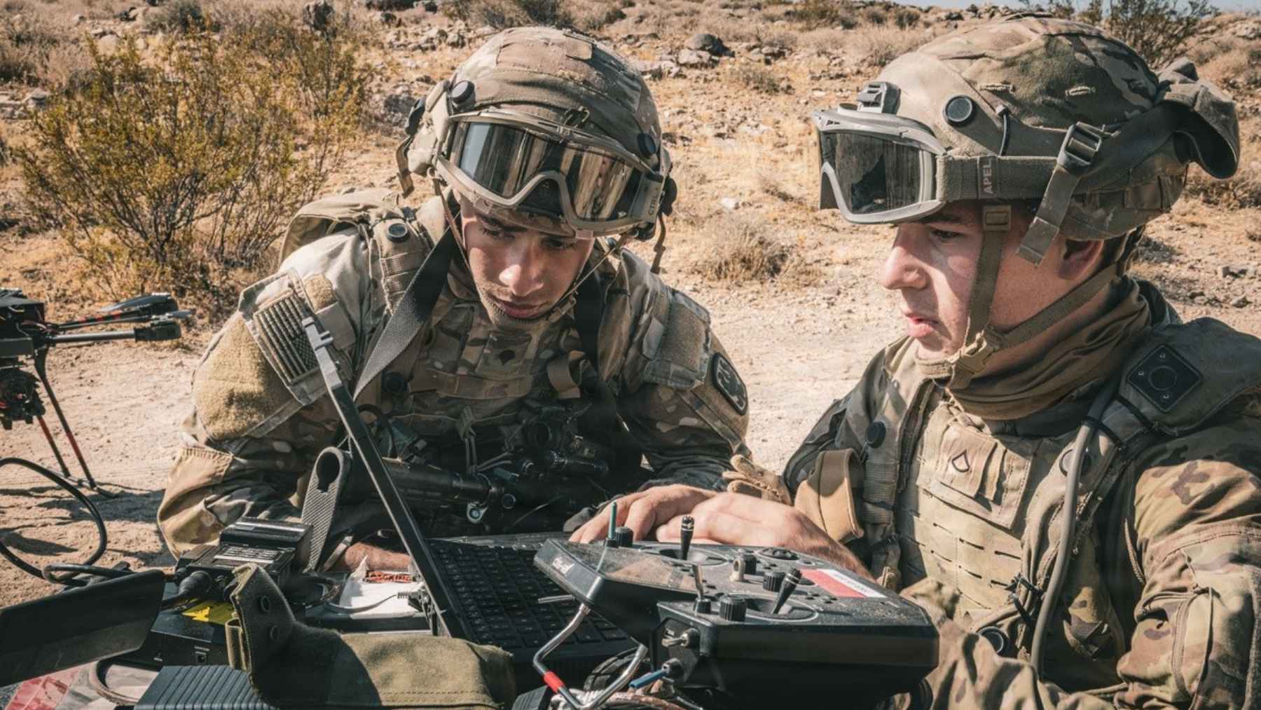 Advanced electronic warfare equipment and antenna arrays deployed for tactical military testing.