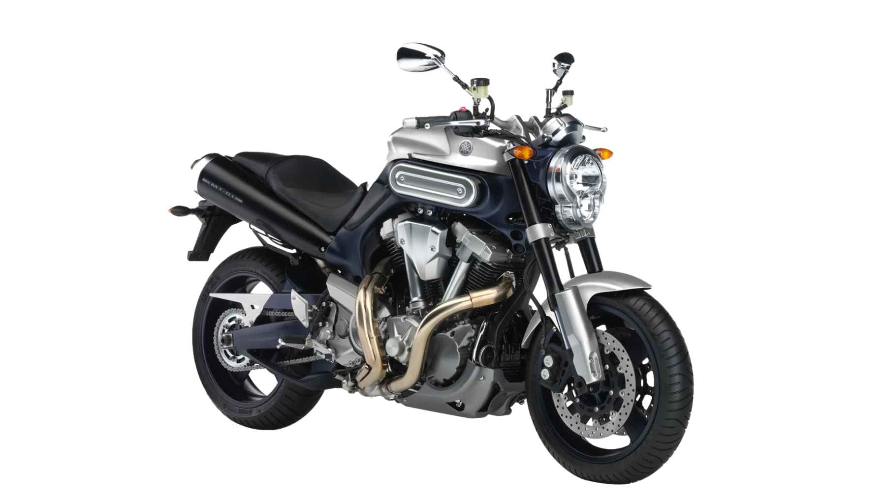 A classic Yamaha MT-01 naked motorcycle parked on a street, showcasing its massive air-cooled V-twin engine and performance hardware.