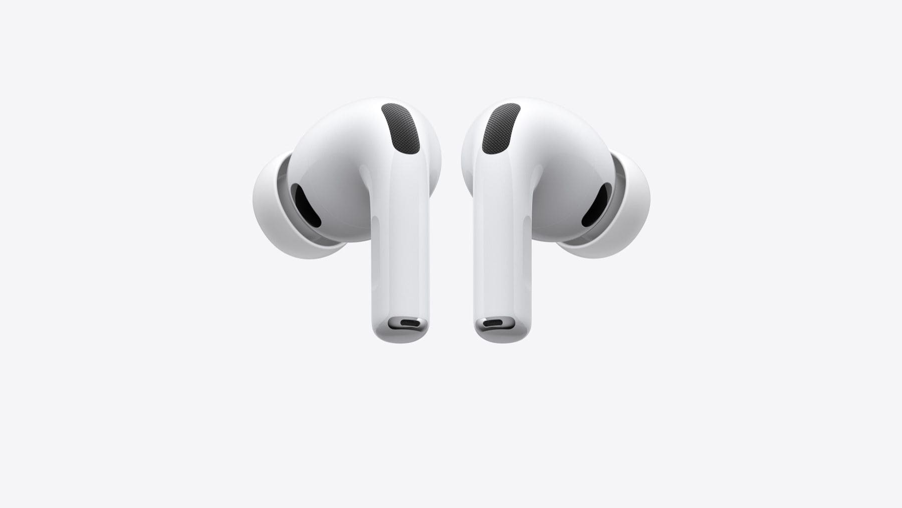 Apple AirPods Pro en blanco sobre fondo neutro, auriculares que serán compatibles con HyperOS 3.1 de Xiaomi.