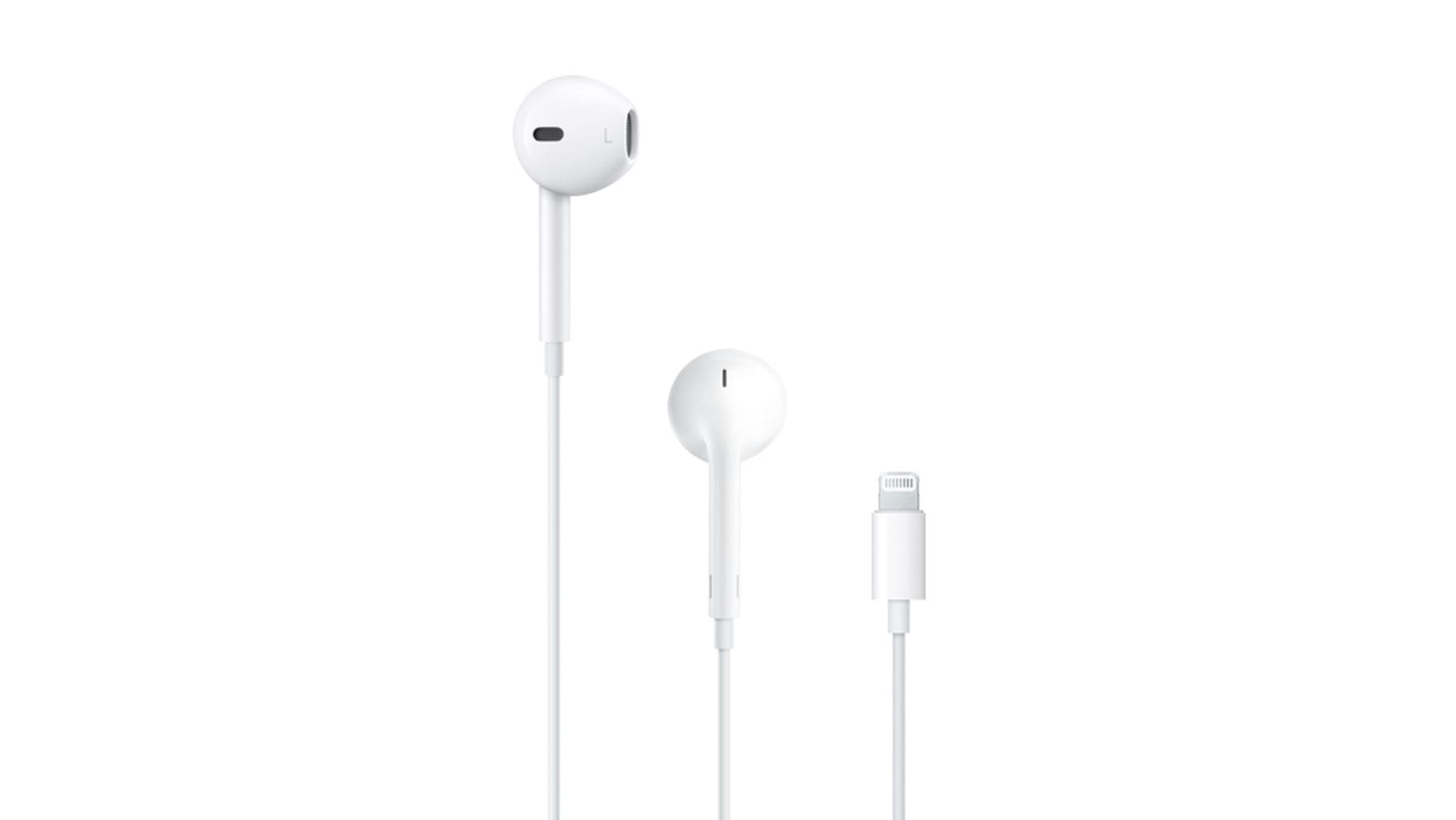 Auriculares con cable blancos tipo EarPods sobre fondo neutro símbolo del regreso de la tecnología retro.