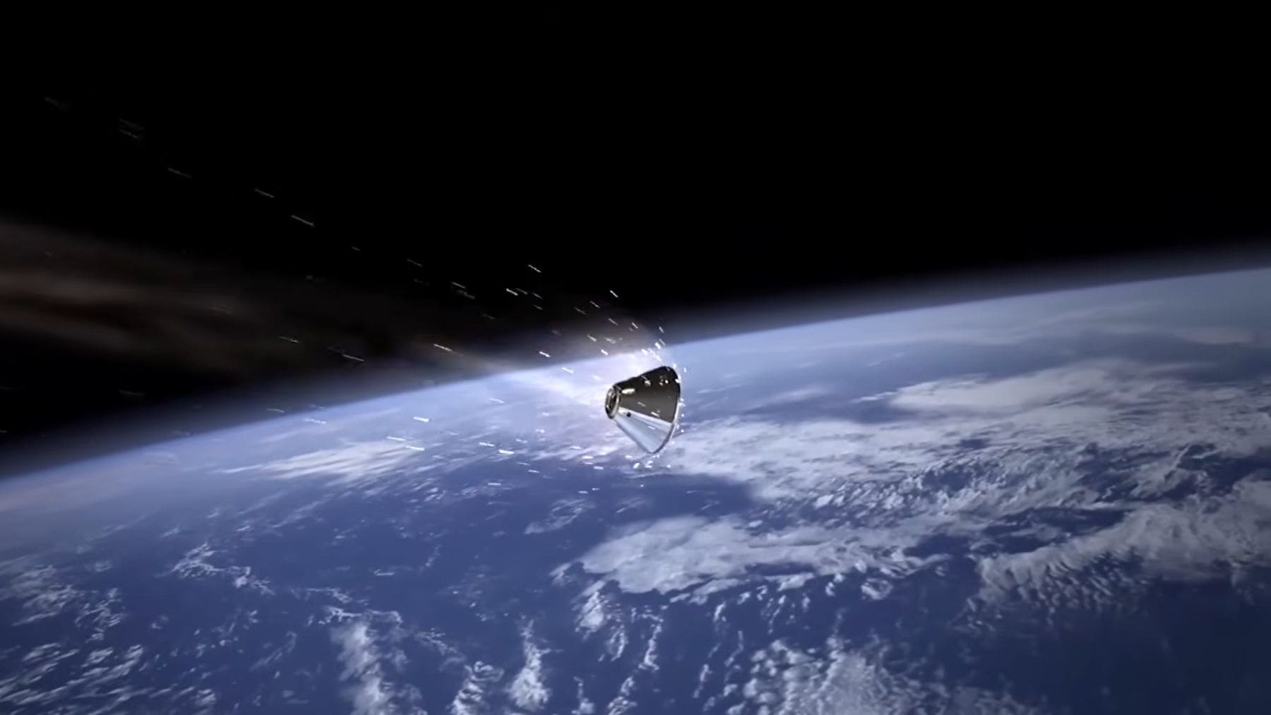 Cápsula Orion de la NASA durante Artemis II sobre la Tierra vista desde el espacio.