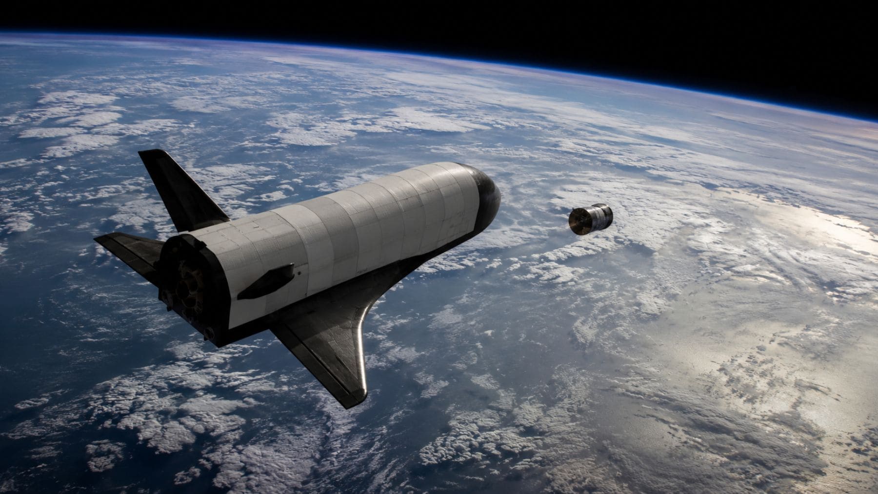 Recreación del avión espacial secreto reutilizable de China liberando un objeto no identificado mientras orbita la Tierra.